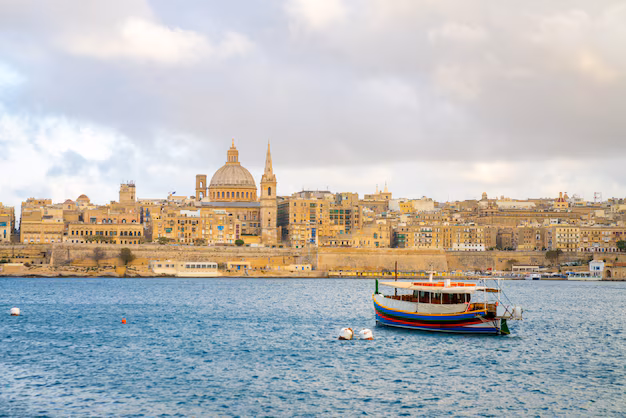 beautiful-sunset-view-historic-sites-by-river-valletta-malta_181624-49420